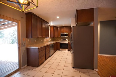 Eric Feely, NextHome Virtual, C: , eric,  : Charming Home in on Black Canyon Golf Club At Montrose in Colorado - for sale on GolfHomes.com, golf home, golf lot