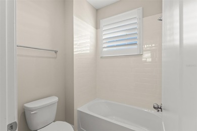 Discover peace and tranquility in this stunning premium on Eagle Creek Golf Club in Florida - for sale on GolfHomes.com, golf home, golf lot