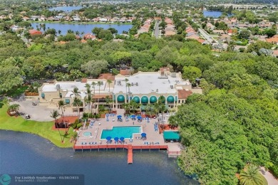 Beautiful lake view 2BR/2BA condo in Pine Island Ridge! Spacious on Pine Island Ridge Country Club in Florida - for sale on GolfHomes.com, golf home, golf lot