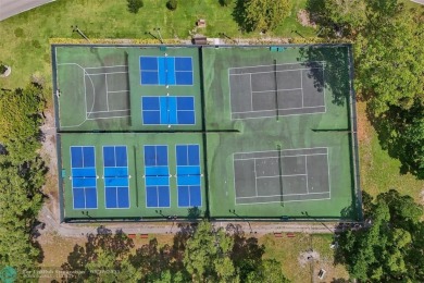 Beautiful lake view 2BR/2BA condo in Pine Island Ridge! Spacious on Pine Island Ridge Country Club in Florida - for sale on GolfHomes.com, golf home, golf lot