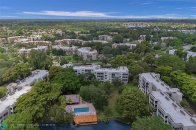 Beautiful lake view 2BR/2BA condo in Pine Island Ridge! Spacious on Pine Island Ridge Country Club in Florida - for sale on GolfHomes.com, golf home, golf lot