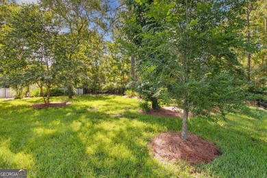 Welcome to your dream home in the prestigious gated community of on The Club At Osprey Cove in Georgia - for sale on GolfHomes.com, golf home, golf lot