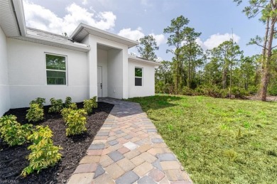 The best-priced BRAND NEW CONSTRUCTION on a HALF-ACRE LOT in on Lehigh Resort Club in Florida - for sale on GolfHomes.com, golf home, golf lot