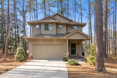 This beautiful 4-bedroom, 2.5-bath perfectly positioned on a on Woodlake Country Club in North Carolina - for sale on GolfHomes.com, golf home, golf lot