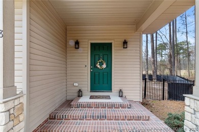 This beautiful 4-bedroom, 2.5-bath perfectly positioned on a on Woodlake Country Club in North Carolina - for sale on GolfHomes.com, golf home, golf lot