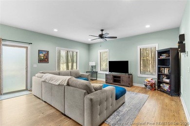 This beautiful 4-bedroom, 2.5-bath perfectly positioned on a on Woodlake Country Club in North Carolina - for sale on GolfHomes.com, golf home, golf lot