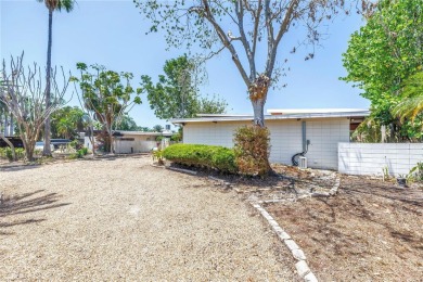 A unique, Mid-Century Modern home located on highly sought-after on Treasure Bay Golf and Tennis in Florida - for sale on GolfHomes.com, golf home, golf lot