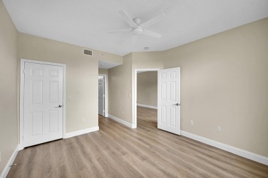 This spacious 3-bedroom, 2-bathroom with a lakeview balcony on Greenview Cove Golf Club in Florida - for sale on GolfHomes.com, golf home, golf lot