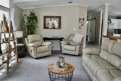 RELAX in this impeccably maintained 2003 Palm Harbor 2 bed/2 on The Club At Pointe West in Florida - for sale on GolfHomes.com, golf home, golf lot