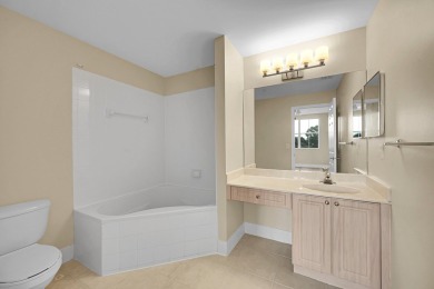 This spacious 3-bedroom, 2-bathroom with a lakeview balcony on Greenview Cove Golf Club in Florida - for sale on GolfHomes.com, golf home, golf lot