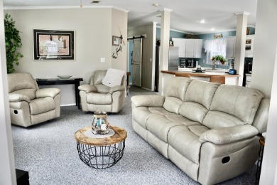 RELAX in this impeccably maintained 2003 Palm Harbor 2 bed/2 on The Club At Pointe West in Florida - for sale on GolfHomes.com, golf home, golf lot