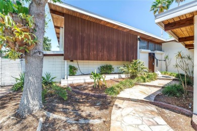 A unique, Mid-Century Modern home located on highly sought-after on Treasure Bay Golf and Tennis in Florida - for sale on GolfHomes.com, golf home, golf lot