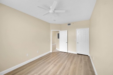 This spacious 3-bedroom, 2-bathroom with a lakeview balcony on Greenview Cove Golf Club in Florida - for sale on GolfHomes.com, golf home, golf lot