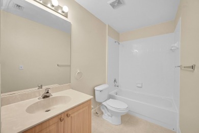 This spacious 3-bedroom, 2-bathroom with a lakeview balcony on Greenview Cove Golf Club in Florida - for sale on GolfHomes.com, golf home, golf lot