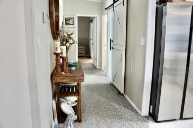 RELAX in this impeccably maintained 2003 Palm Harbor 2 bed/2 on The Club At Pointe West in Florida - for sale on GolfHomes.com, golf home, golf lot