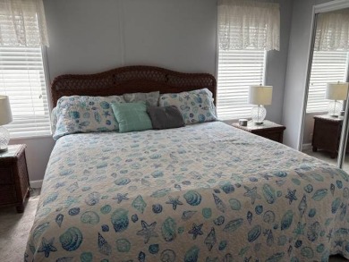 This home is in a 55 plus community with a monthly lot rent of on Crystal Lake Club in Florida - for sale on GolfHomes.com, golf home, golf lot