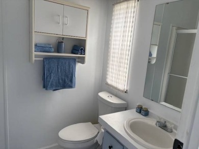 This home is in a 55 plus community with a monthly lot rent of on Crystal Lake Club in Florida - for sale on GolfHomes.com, golf home, golf lot