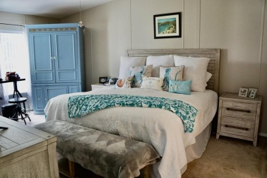 RELAX in this impeccably maintained 2003 Palm Harbor 2 bed/2 on The Club At Pointe West in Florida - for sale on GolfHomes.com, golf home, golf lot
