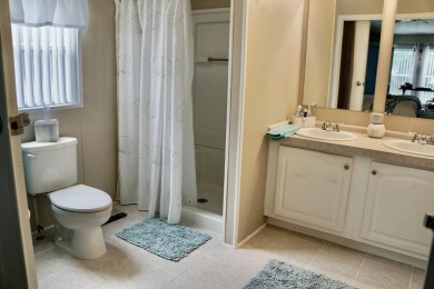 RELAX in this impeccably maintained 2003 Palm Harbor 2 bed/2 on The Club At Pointe West in Florida - for sale on GolfHomes.com, golf home, golf lot