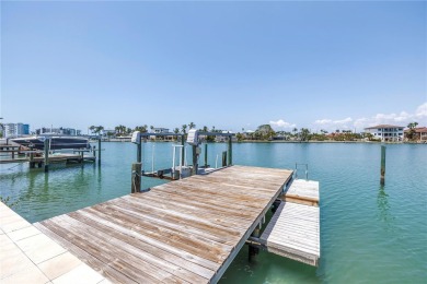 A unique, Mid-Century Modern home located on highly sought-after on Treasure Bay Golf and Tennis in Florida - for sale on GolfHomes.com, golf home, golf lot