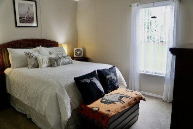 RELAX in this impeccably maintained 2003 Palm Harbor 2 bed/2 on The Club At Pointe West in Florida - for sale on GolfHomes.com, golf home, golf lot