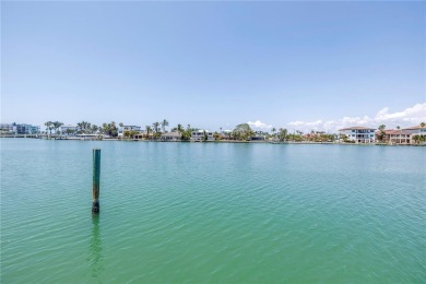 A unique, Mid-Century Modern home located on highly sought-after on Treasure Bay Golf and Tennis in Florida - for sale on GolfHomes.com, golf home, golf lot
