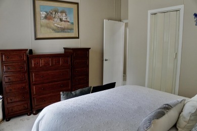 RELAX in this impeccably maintained 2003 Palm Harbor 2 bed/2 on The Club At Pointe West in Florida - for sale on GolfHomes.com, golf home, golf lot