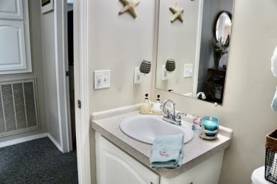 RELAX in this impeccably maintained 2003 Palm Harbor 2 bed/2 on The Club At Pointe West in Florida - for sale on GolfHomes.com, golf home, golf lot