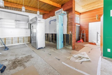 A unique, Mid-Century Modern home located on highly sought-after on Treasure Bay Golf and Tennis in Florida - for sale on GolfHomes.com, golf home, golf lot