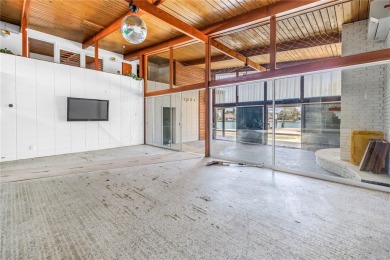 A unique, Mid-Century Modern home located on highly sought-after on Treasure Bay Golf and Tennis in Florida - for sale on GolfHomes.com, golf home, golf lot