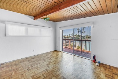 A unique, Mid-Century Modern home located on highly sought-after on Treasure Bay Golf and Tennis in Florida - for sale on GolfHomes.com, golf home, golf lot
