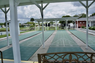 RELAX in this impeccably maintained 2003 Palm Harbor 2 bed/2 on The Club At Pointe West in Florida - for sale on GolfHomes.com, golf home, golf lot