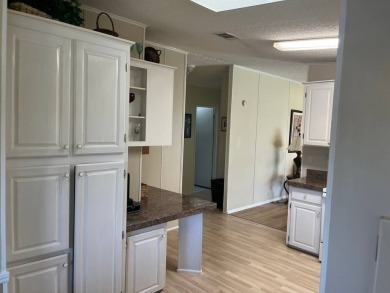 Experience Privacy, Modern Comfort, and Resort-Style Living - on Four Lakes Golf Club in Florida - for sale on GolfHomes.com, golf home, golf lot