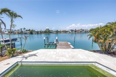 A unique, Mid-Century Modern home located on highly sought-after on Treasure Bay Golf and Tennis in Florida - for sale on GolfHomes.com, golf home, golf lot
