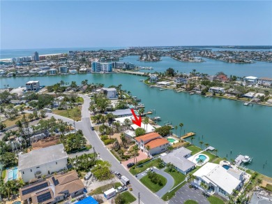 A unique, Mid-Century Modern home located on highly sought-after on Treasure Bay Golf and Tennis in Florida - for sale on GolfHomes.com, golf home, golf lot