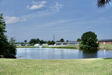RELAX in this impeccably maintained 2003 Palm Harbor 2 bed/2 on The Club At Pointe West in Florida - for sale on GolfHomes.com, golf home, golf lot