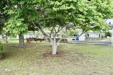 RELAX in this impeccably maintained 2003 Palm Harbor 2 bed/2 on The Club At Pointe West in Florida - for sale on GolfHomes.com, golf home, golf lot