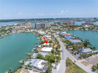 A unique, Mid-Century Modern home located on highly sought-after on Treasure Bay Golf and Tennis in Florida - for sale on GolfHomes.com, golf home, golf lot
