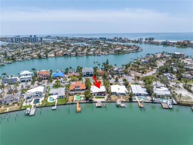 A unique, Mid-Century Modern home located on highly sought-after on Treasure Bay Golf and Tennis in Florida - for sale on GolfHomes.com, golf home, golf lot