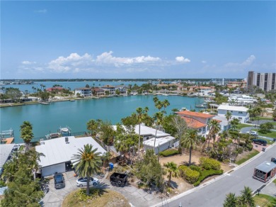 A unique, Mid-Century Modern home located on highly sought-after on Treasure Bay Golf and Tennis in Florida - for sale on GolfHomes.com, golf home, golf lot