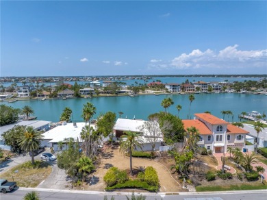 A unique, Mid-Century Modern home located on highly sought-after on Treasure Bay Golf and Tennis in Florida - for sale on GolfHomes.com, golf home, golf lot
