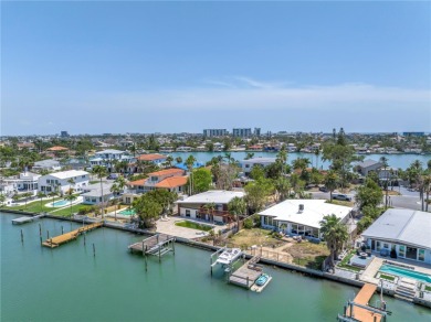 A unique, Mid-Century Modern home located on highly sought-after on Treasure Bay Golf and Tennis in Florida - for sale on GolfHomes.com, golf home, golf lot