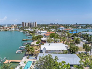 A unique, Mid-Century Modern home located on highly sought-after on Treasure Bay Golf and Tennis in Florida - for sale on GolfHomes.com, golf home, golf lot