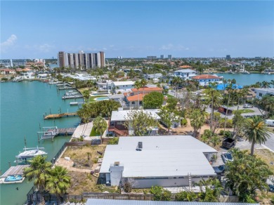A unique, Mid-Century Modern home located on highly sought-after on Treasure Bay Golf and Tennis in Florida - for sale on GolfHomes.com, golf home, golf lot
