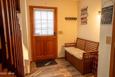 Chalet style home in Pinetop Lakes. 3 bedroom 2 bath, one car on Pinetop Lakes Country Club in Arizona - for sale on GolfHomes.com, golf home, golf lot