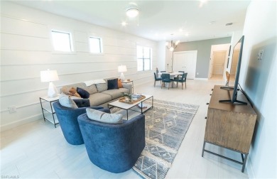 Move-in ready and designer-furnished, this former model home is on Panther Run Golf Club in Florida - for sale on GolfHomes.com, golf home, golf lot