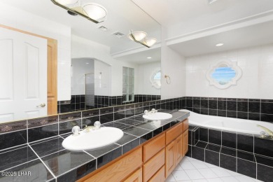 Take a look at this BEAUTIFUL home right on the Lake Havasu Golf on London Bridge Golf Course in Arizona - for sale on GolfHomes.com, golf home, golf lot