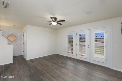Take a look at this BEAUTIFUL home right on the Lake Havasu Golf on London Bridge Golf Course in Arizona - for sale on GolfHomes.com, golf home, golf lot