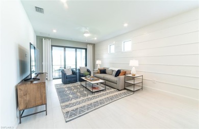 Move-in ready and designer-furnished, this former model home is on Panther Run Golf Club in Florida - for sale on GolfHomes.com, golf home, golf lot