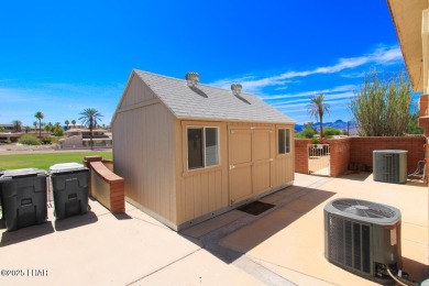 Take a look at this BEAUTIFUL home right on the Lake Havasu Golf on London Bridge Golf Course in Arizona - for sale on GolfHomes.com, golf home, golf lot